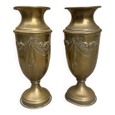 Pair of embossed brass bud vases stamped 17 cm