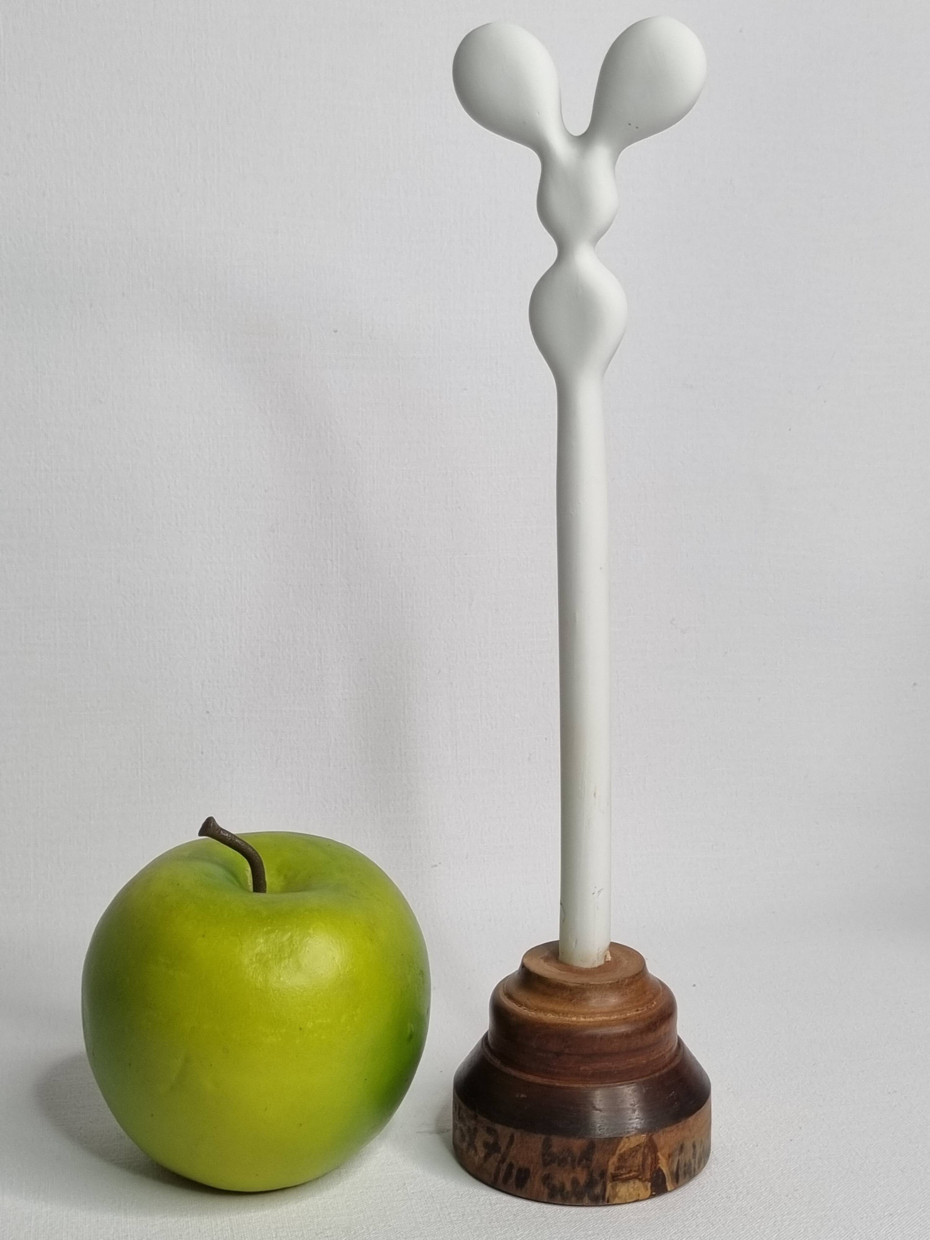 Biomorphic-inspired sculpture, on an industrial wooden base, 27 cm