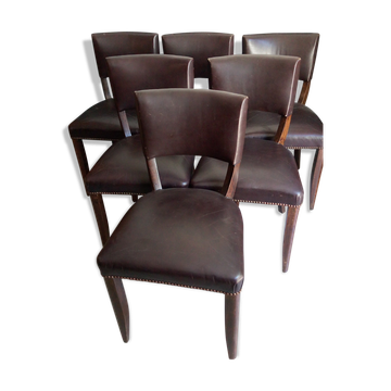 Lot of leather and vintage wood chairs