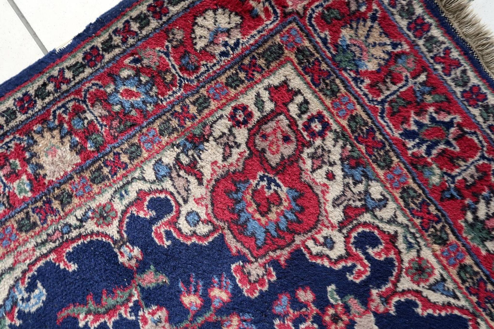 Tapis Kerman antique en laine bleue et rouge