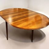 Extendable teak dining table