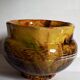 Old provencal pot cover in glazed terracotta