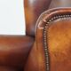 Fauteuil à oreilles en cuir de mouton de style anglais vintage