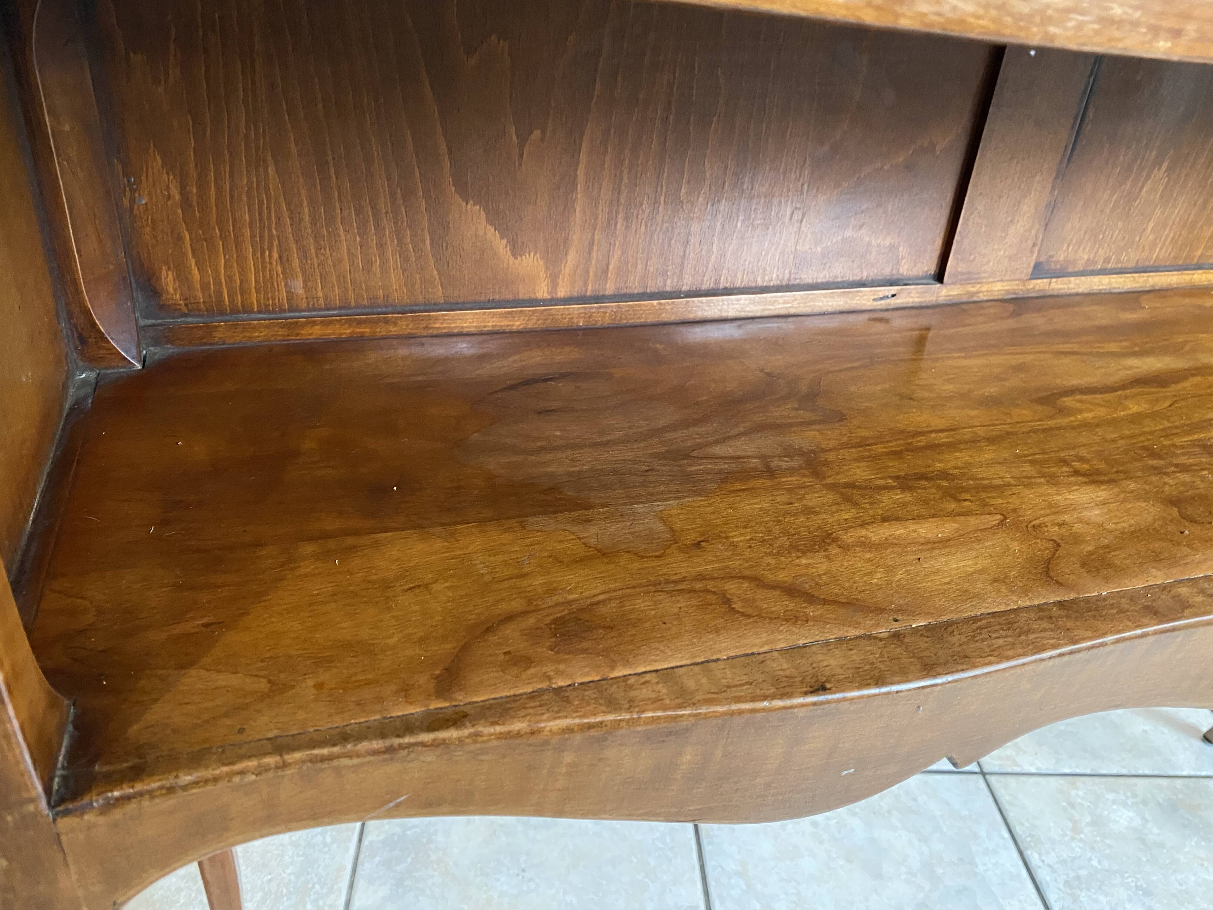 Console with a niche in cherry wood in Louis XV style.