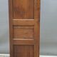 Walnut glazed bookcase with nineteenth century rose window