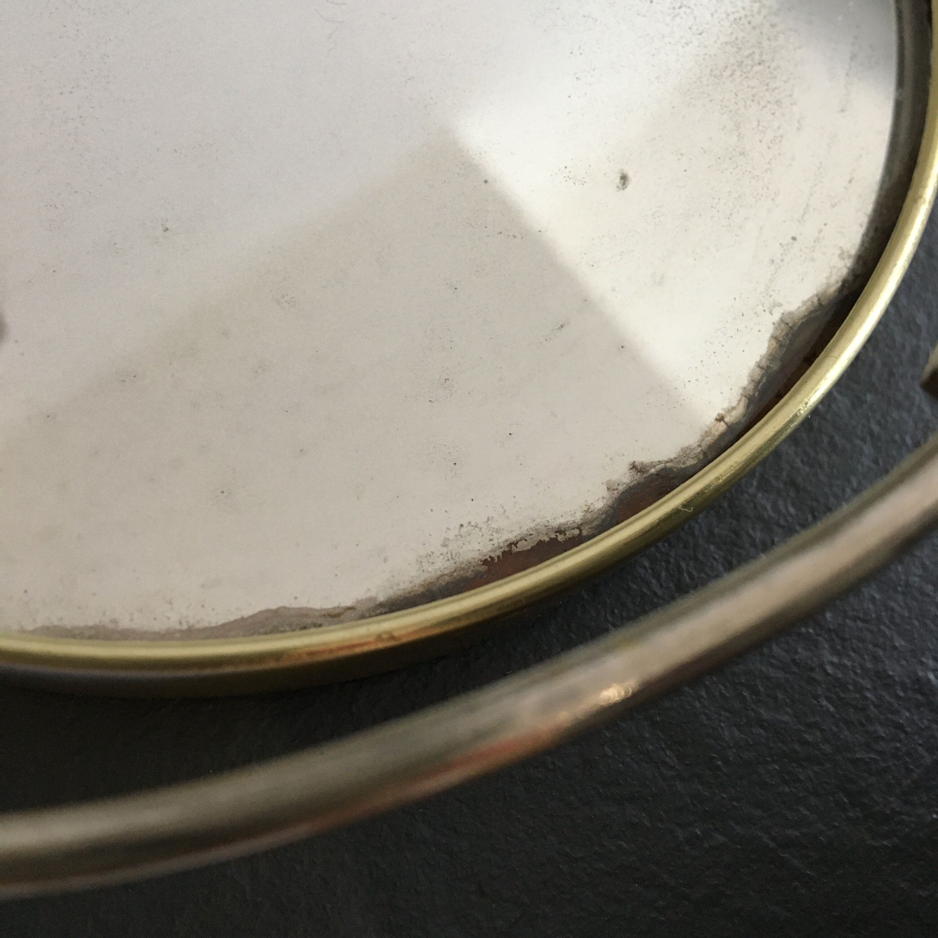 Double round mirror on porcelain foot 15x19cm