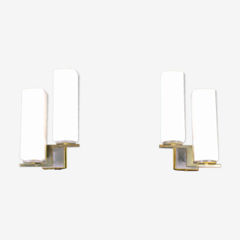 Pair of black and brass wall lamps, Maison Arlus, 1960's