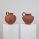 Pair of handcrafted terracotta vases from the mid-century.