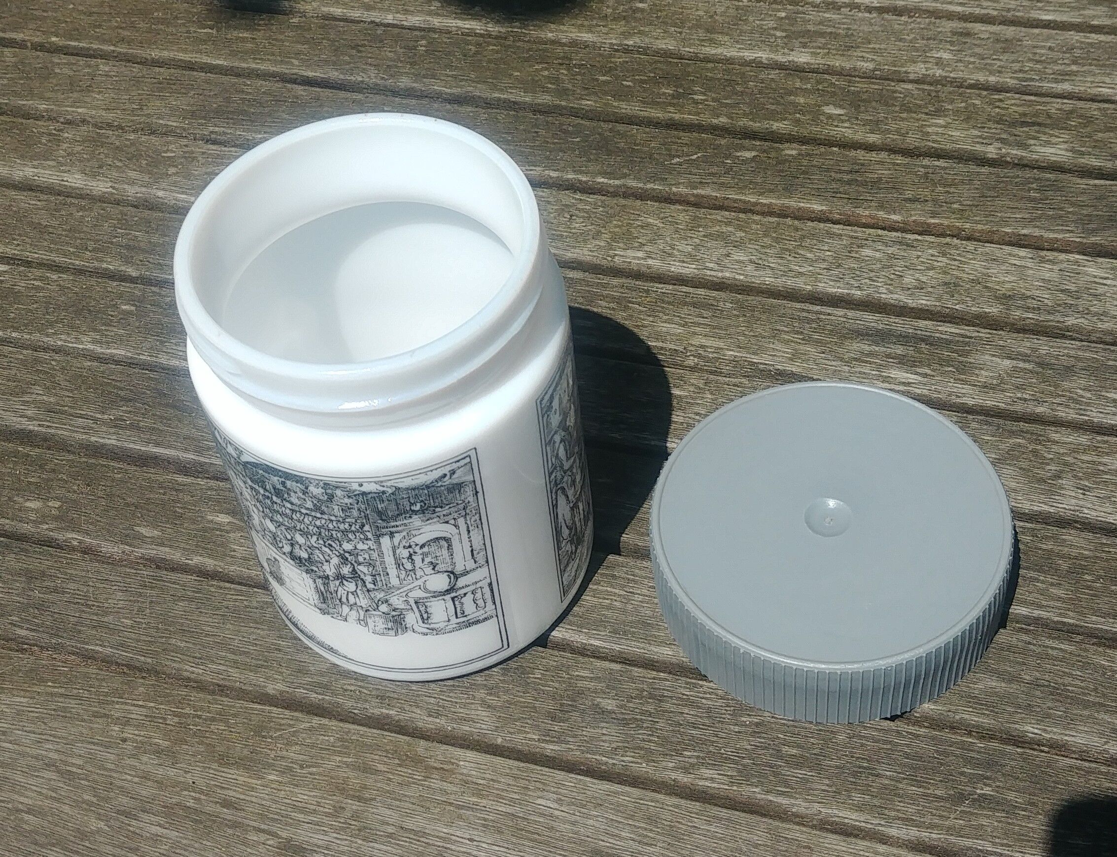 Antique pot in white opaline decorated with apothecary scene