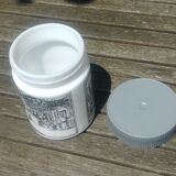 Antique pot in white opaline decorated with apothecary scene