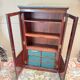 Display cabinet forming a mahogany card index from the restoration period