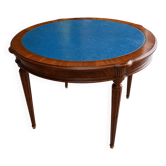 Elegant game table or circular extending side table in Louis XVI style.