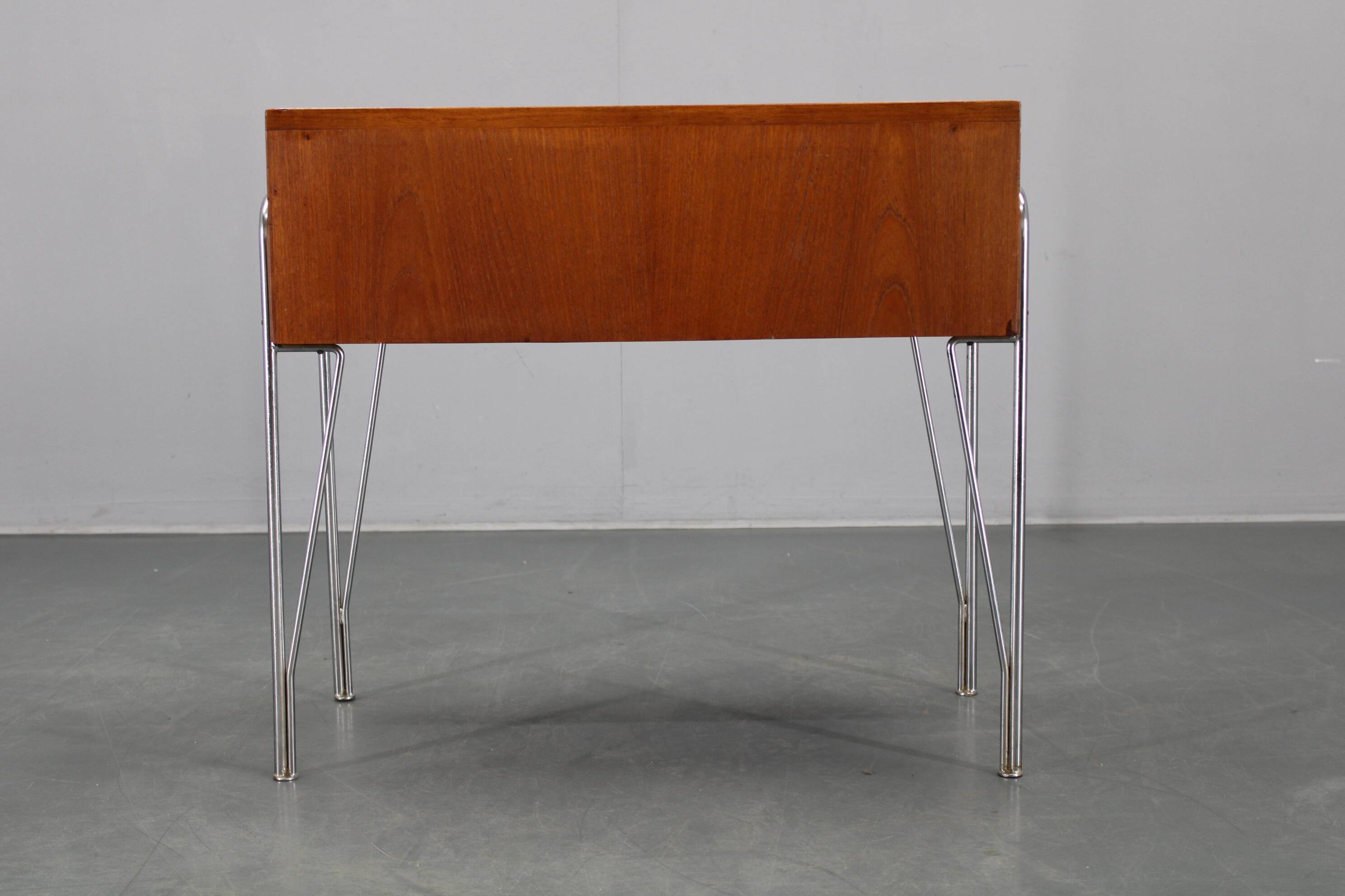 1960s Danish teak shelf cabinet with chrome plated legs