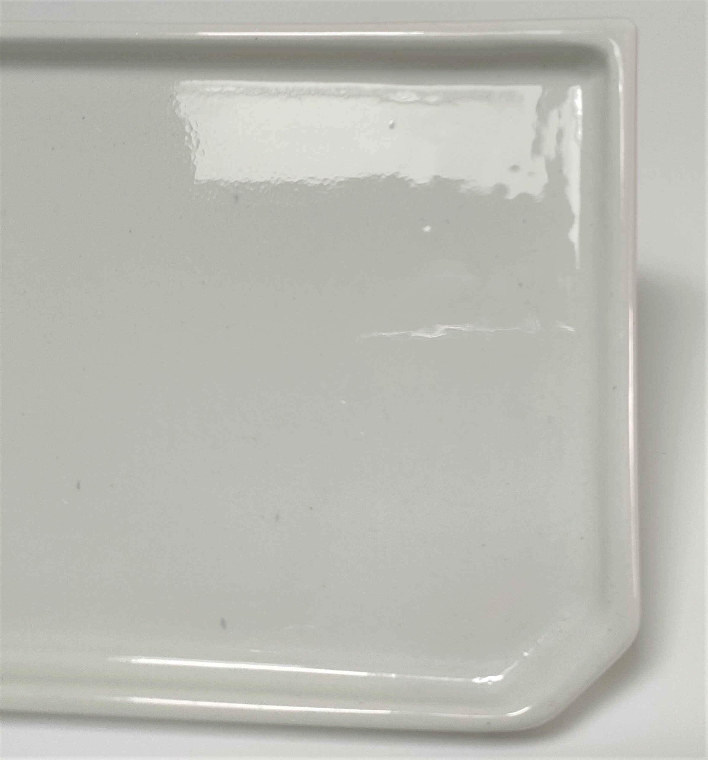 Art Deco white glazed ceramic wall shelf
