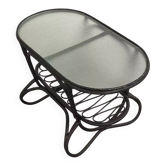 Oval coffee table from the 60s in rattan and glass.