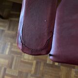 Pair of red chairs in 80s skai