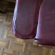 Pair of red chairs in 80s skai