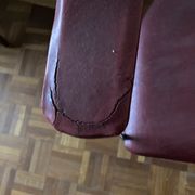 Pair of red chairs in 80s skai