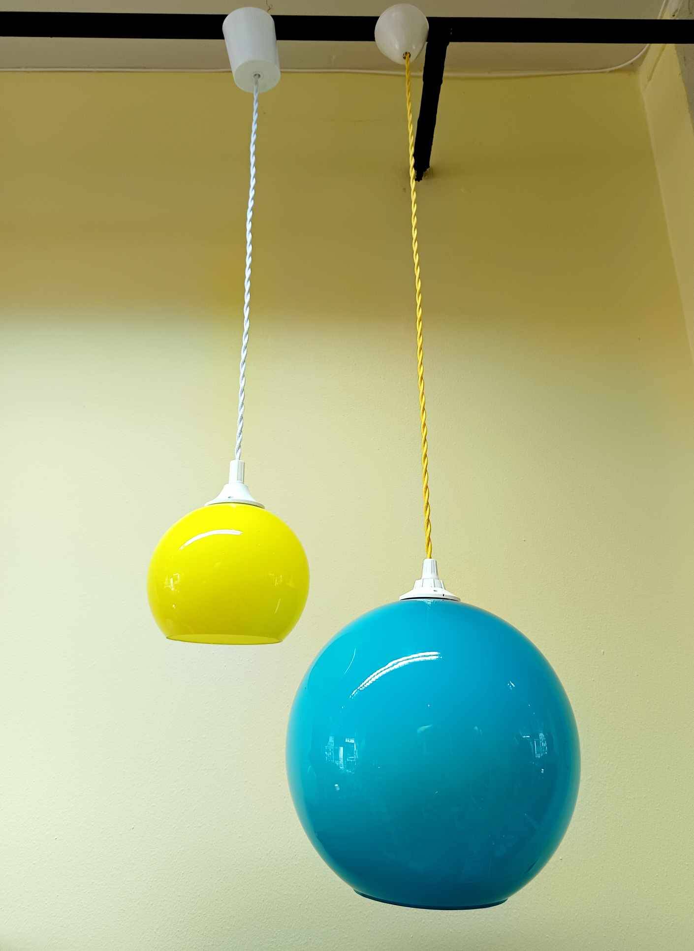 Pair of vintage ball pendant lights circa 1970