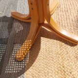 swivel armchair in wood and cane