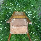 Chaise osier avec assise ouvrable