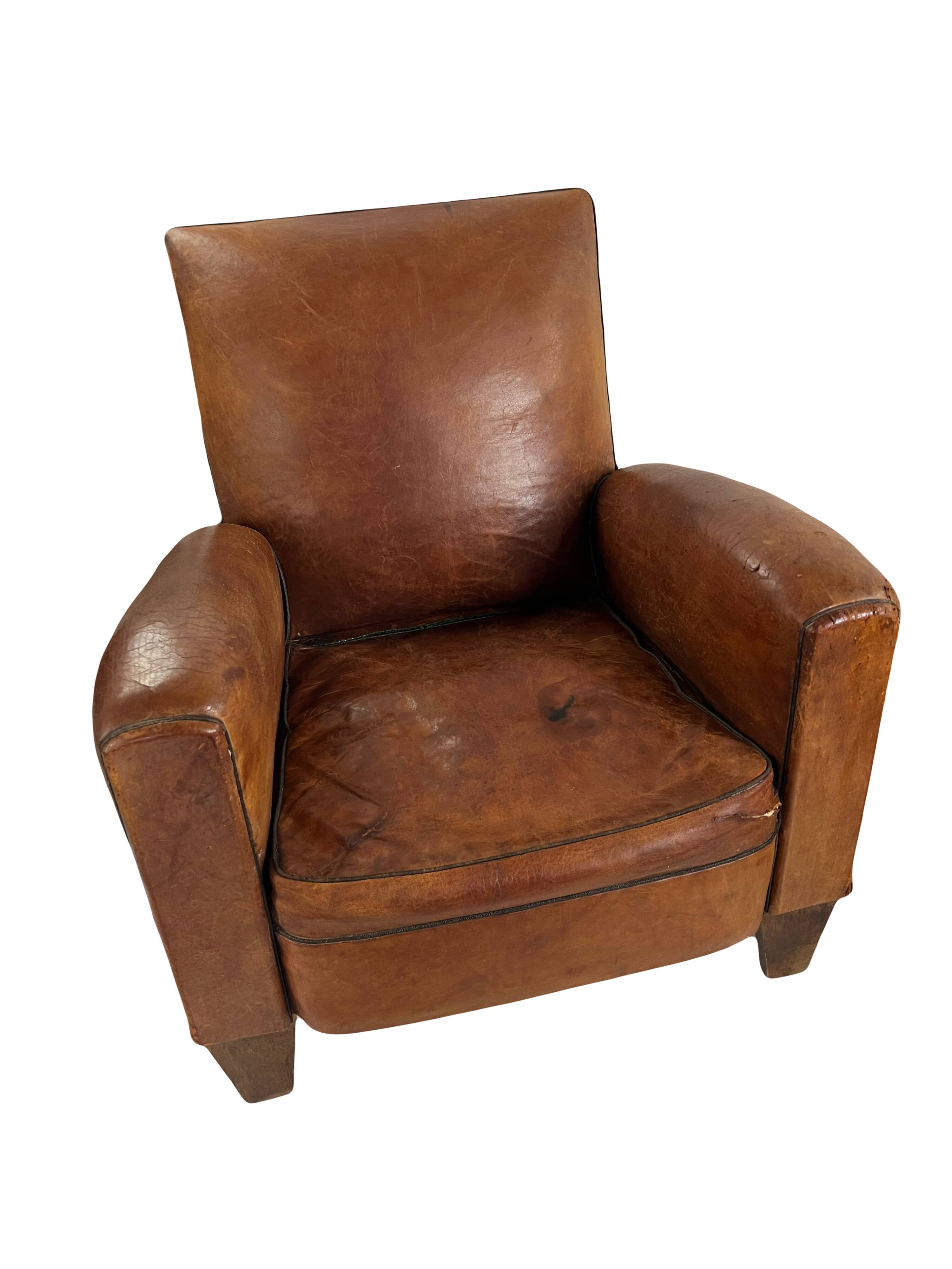 Paire de fauteuils club en cuir patiné – années 1940/50