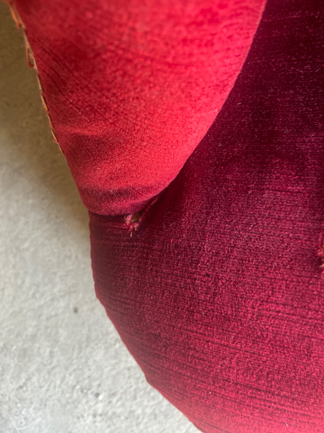 Small old Napoleon III toad sofa in red velvet