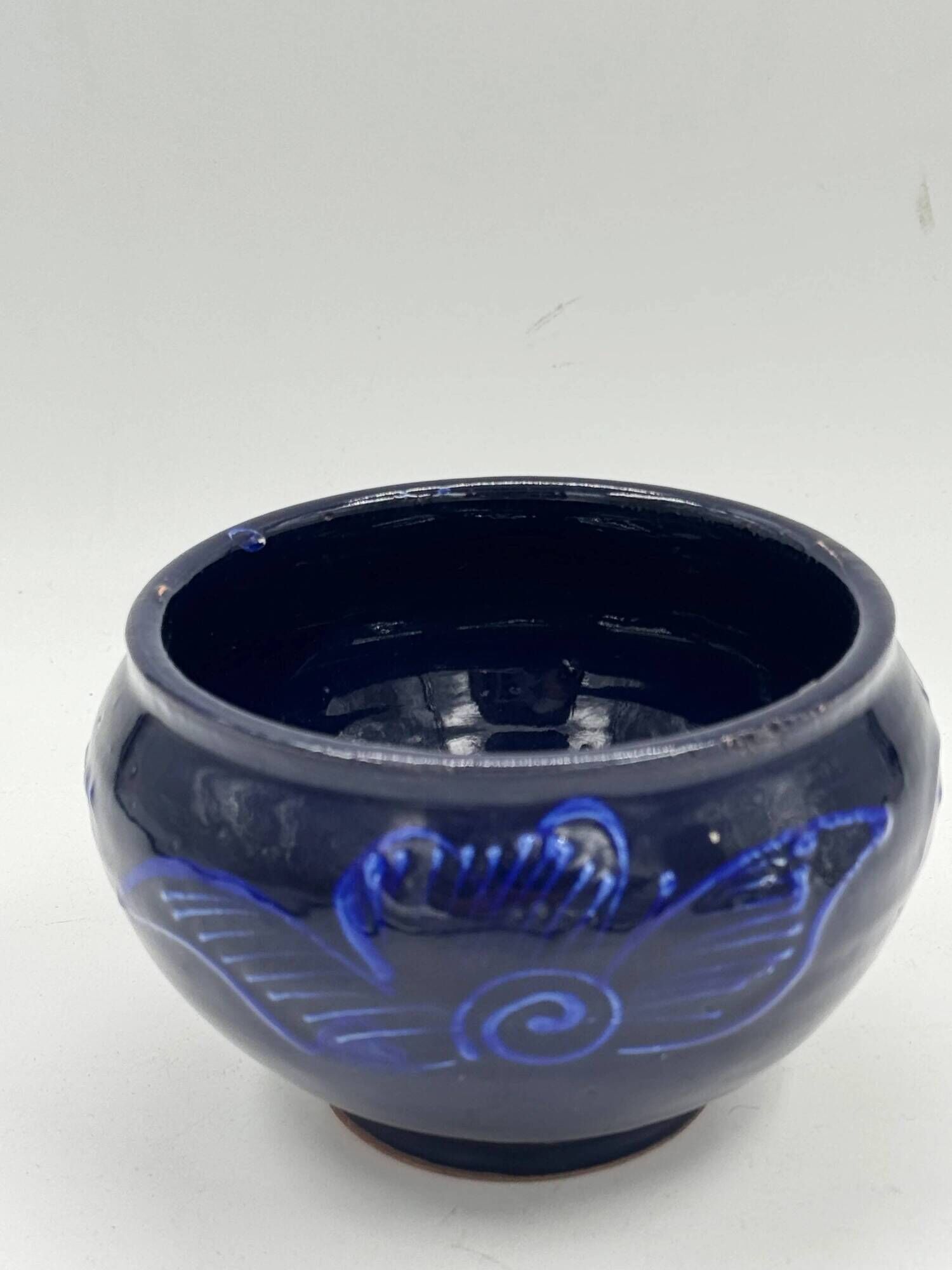 Vintage decorative bowl in cobalt blue ceramic.
