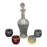 Liqueur carafe, or aperitif, carved with floral decoration in transparent glass and 4 polka dot glasses