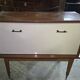 Vintage mid-century bar cabinet from the 1950s–60s.