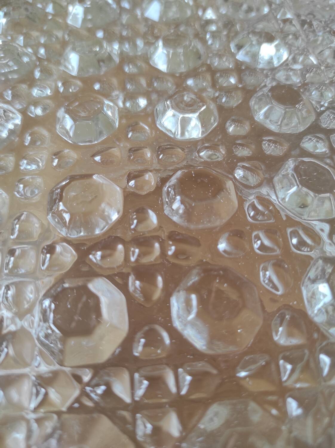 Glass ceiling light globe with relief decoration