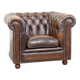 Cowhide English Chesterfield armchair with ball legs and timeless finish