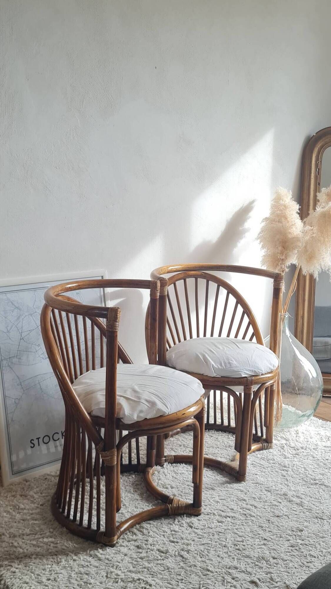 Pair of vintage rattan armchairs circa the 1960s.