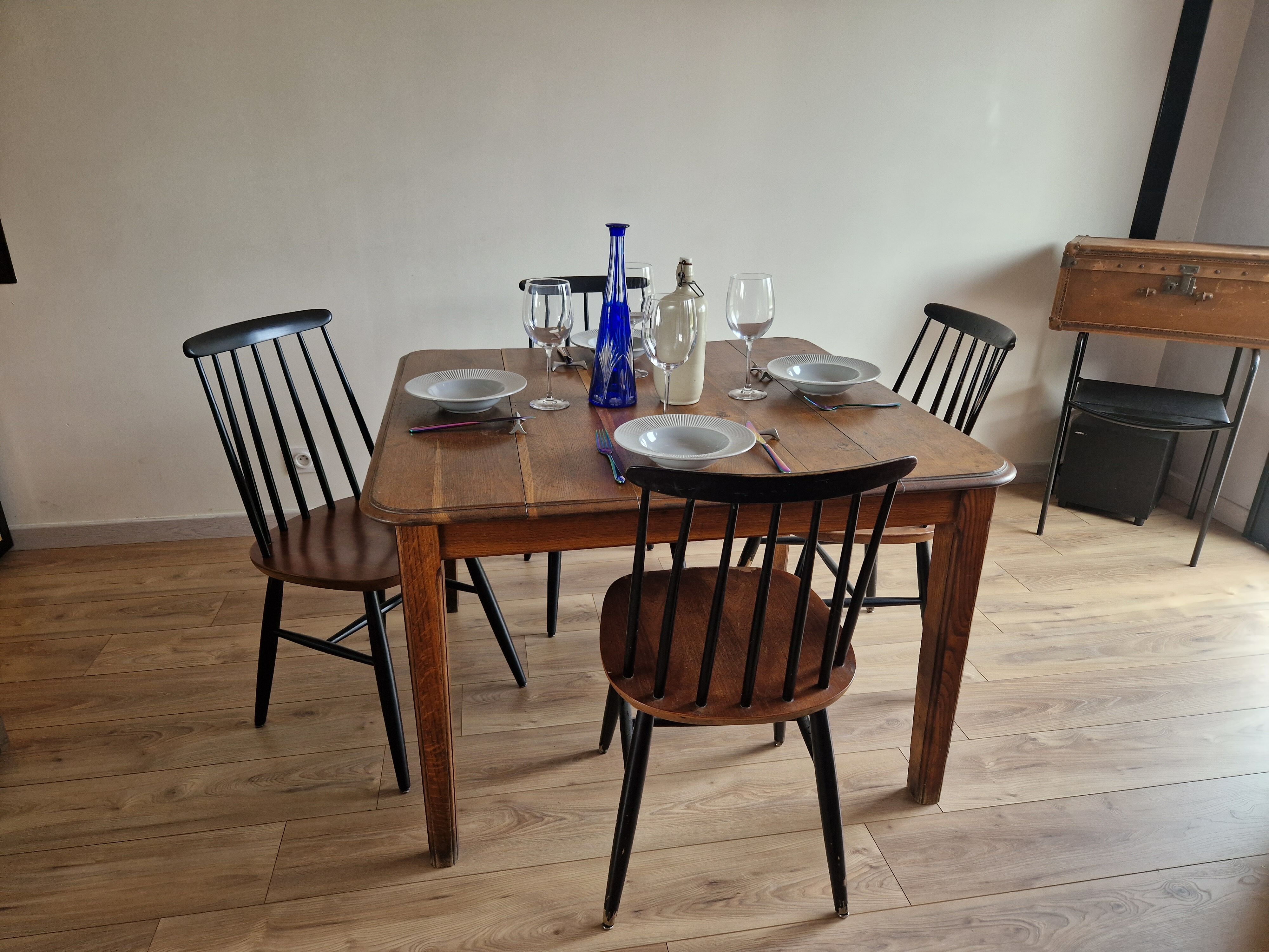 Square art deco dining table in solid wood