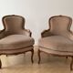Pair of Louis XV armchairs in wood and beige fabric.