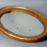 Oval mirror carved wood frame beaded gilded circa 1800 44x35cm SB