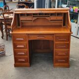 Old American desk in solid oak with S-shaped shutter