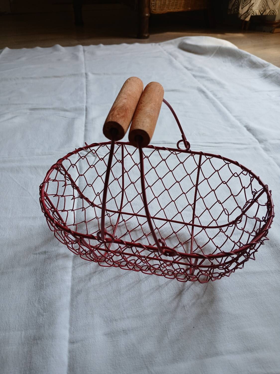 Small red metal basket