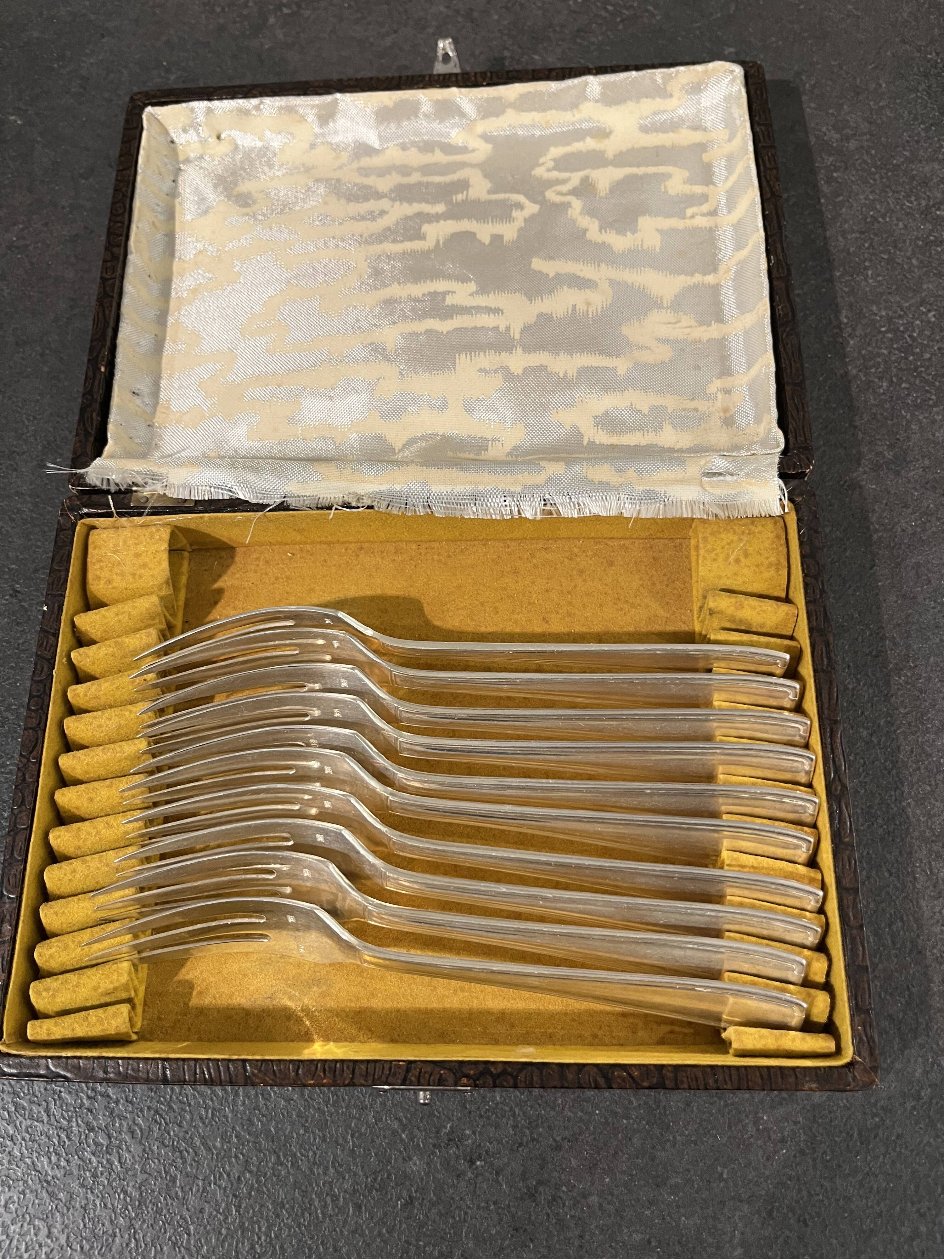 Set of 10 silver-plated dessert forks by François Frionnet.