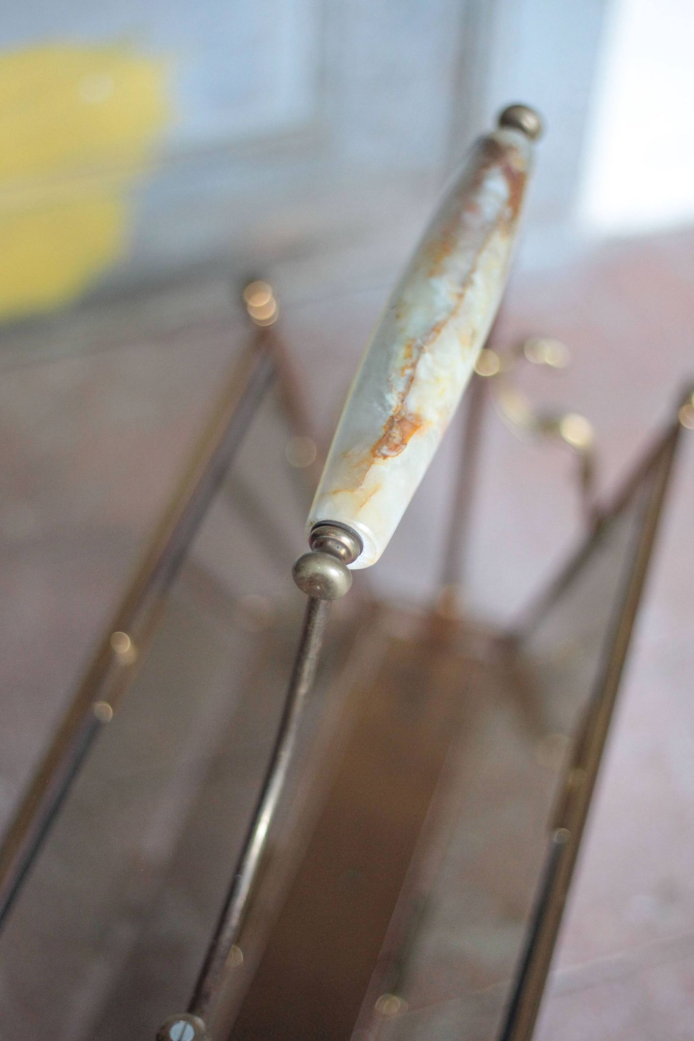 vintage magazine rack, brass and smoked glass magazine rack, newspaper, magazine