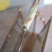 vintage magazine rack, brass and smoked glass magazine rack, newspaper, magazine