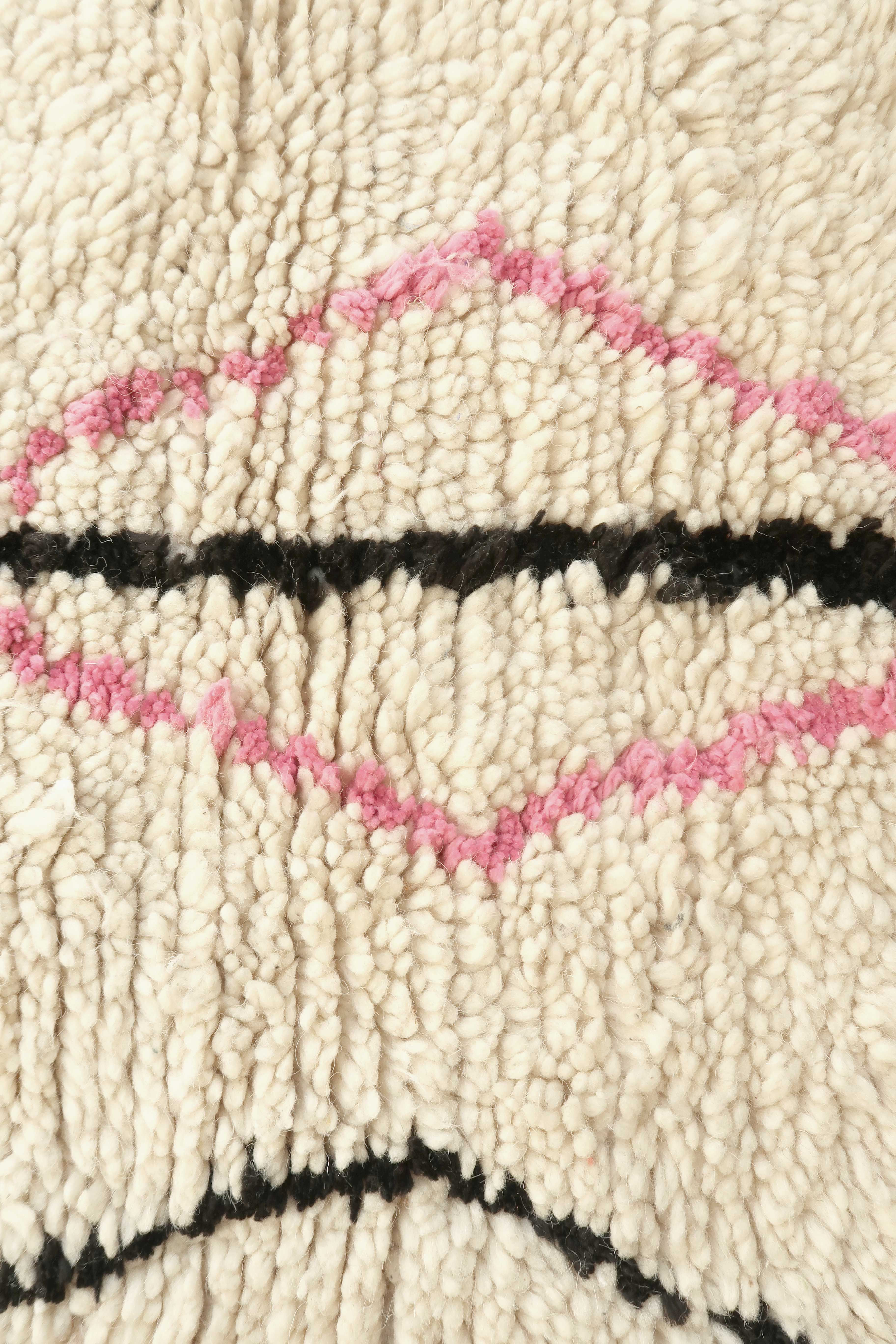 Boujaad Berber rug in pink and black colored wool woven in Morocco 220x140cm