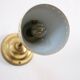 Wall lamp inlaiton and pale yellow lacquered metal