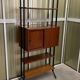 Italian footcase bookcase from the 60s in teak and metal