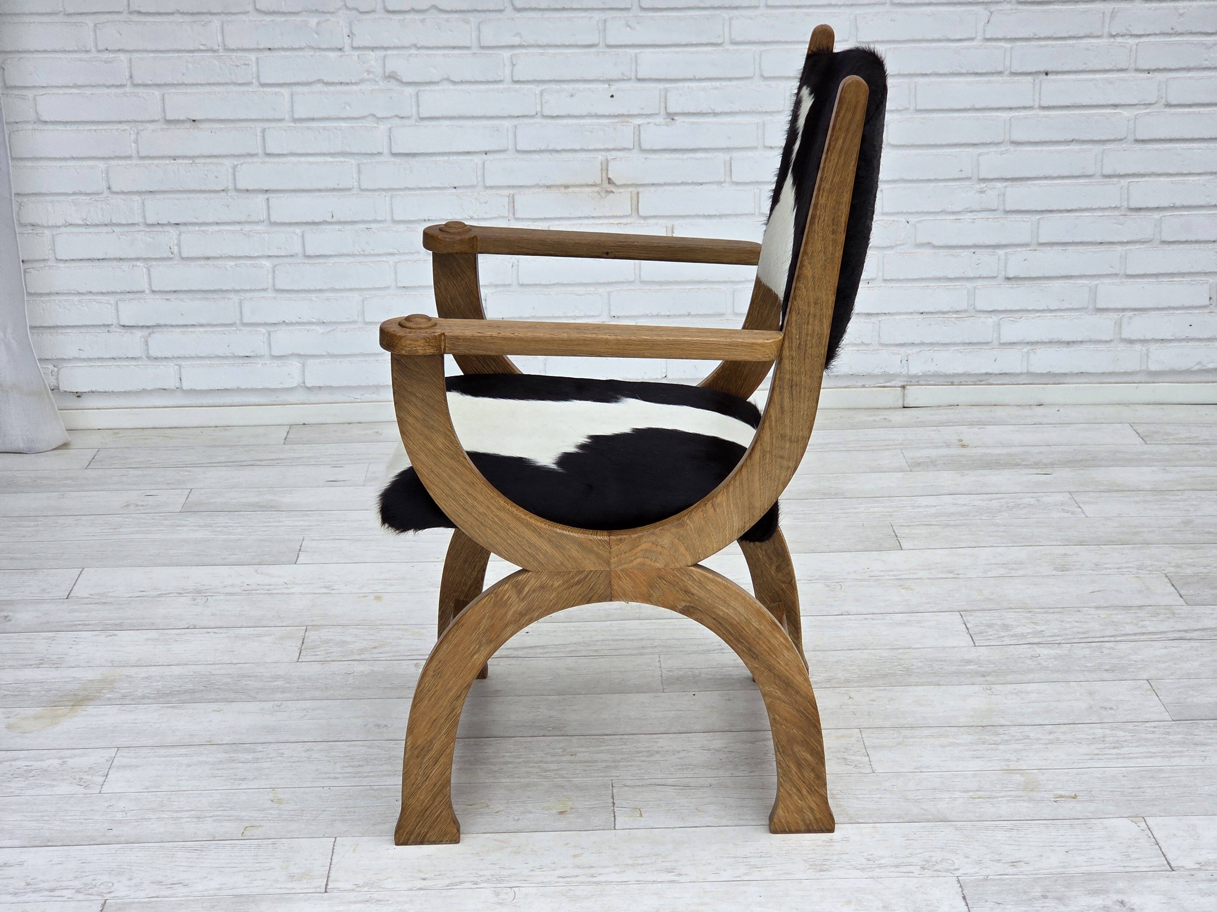 1960s, Danish highback armchair, genuine cowhide, oak wood, reupholstered.