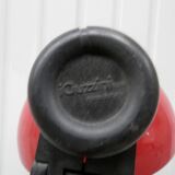 Red desk Guzzini lamp of the 1970s Italy