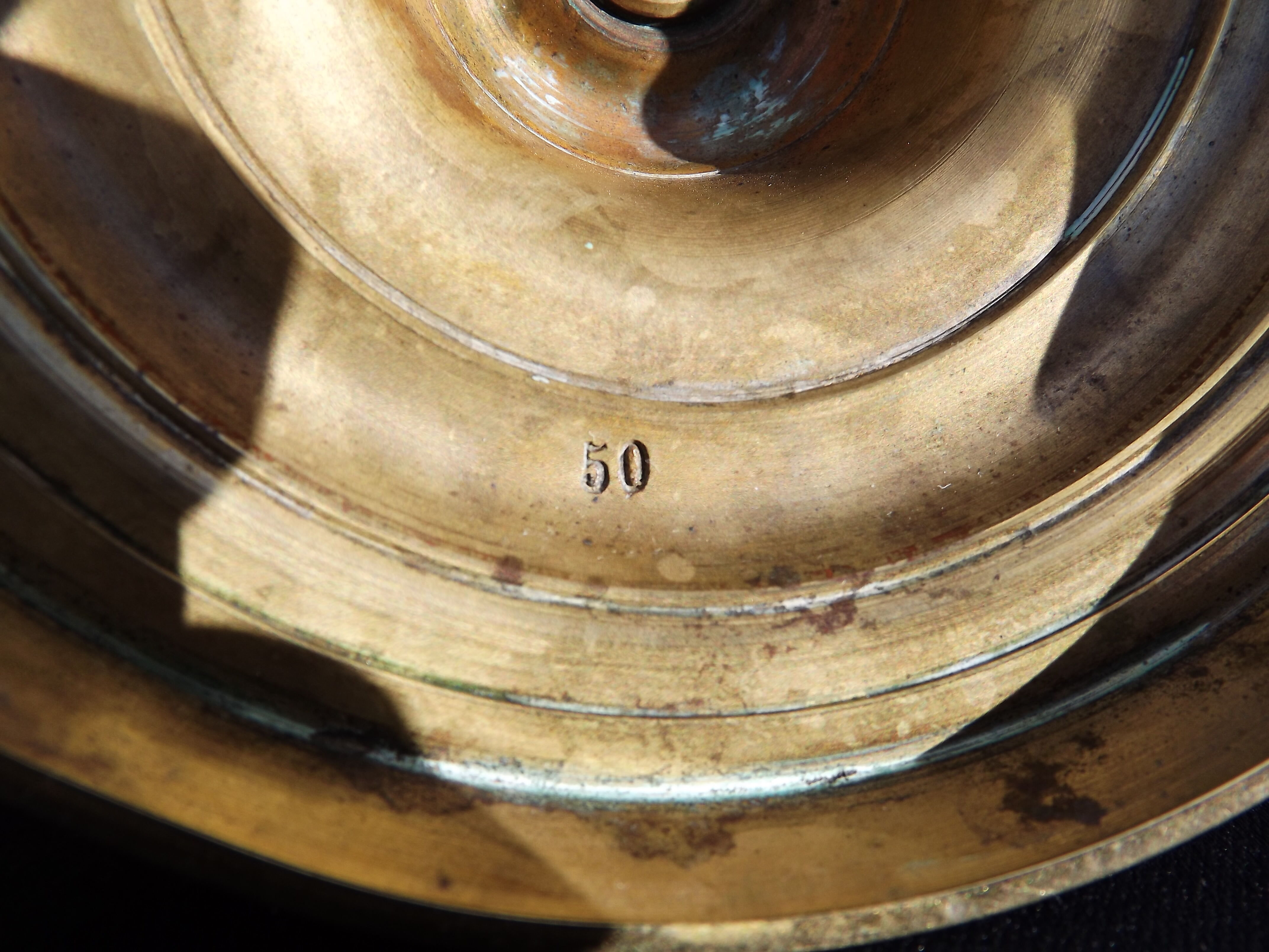 Candlestick period "restoration" in bronze