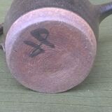Teapot and ceramic cup signed JP