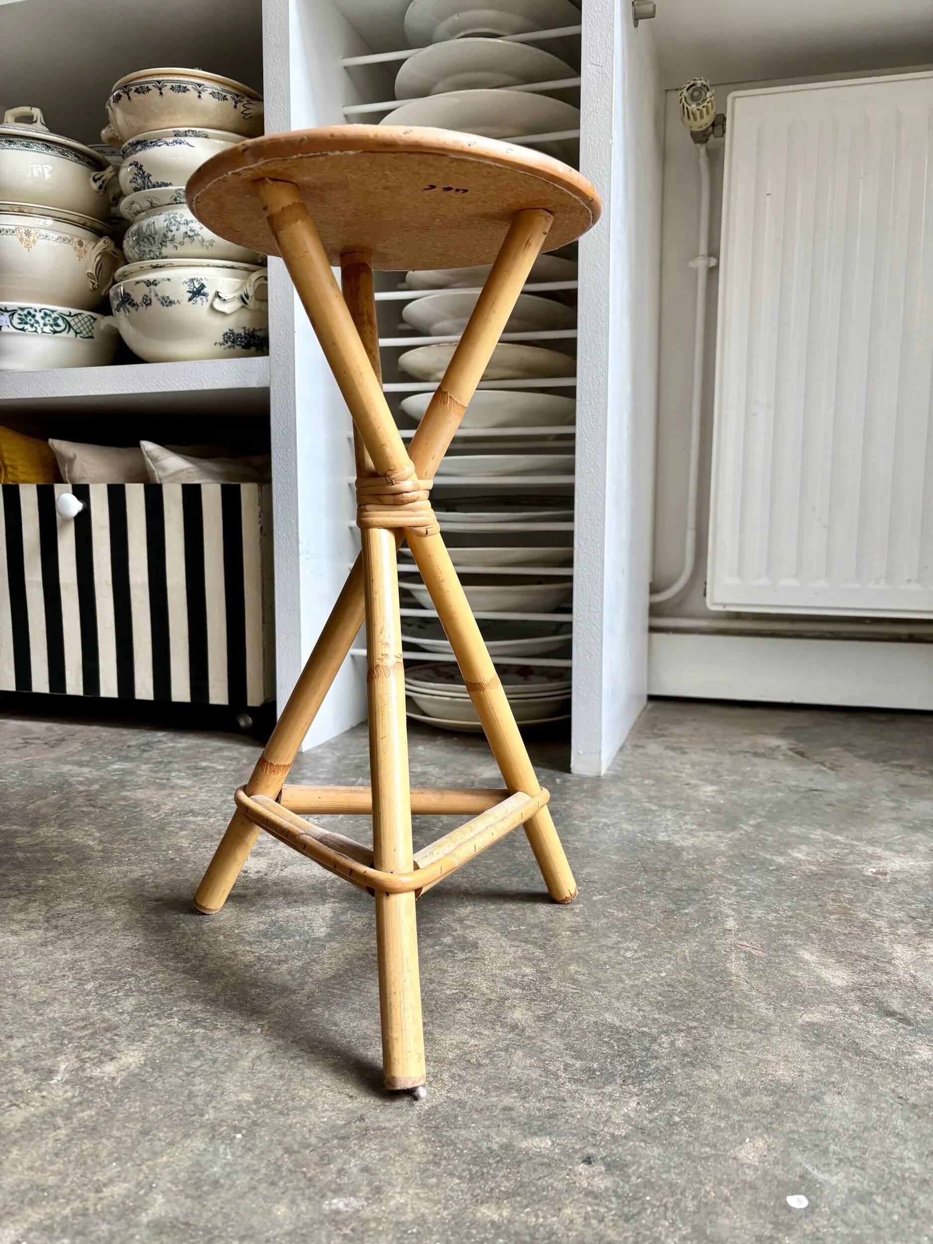 Tripod stool in rattan