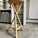 Tripod stool in rattan